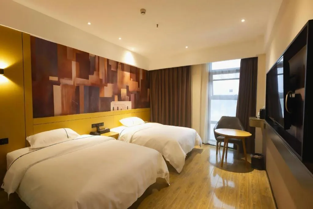 Bed in City Comfort Inn Meishan Wanda Plaza