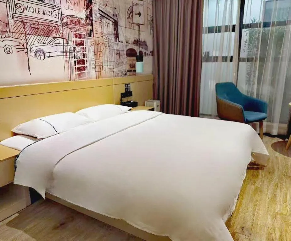 Bed in City Comfort Inn Meishan Wanda Plaza