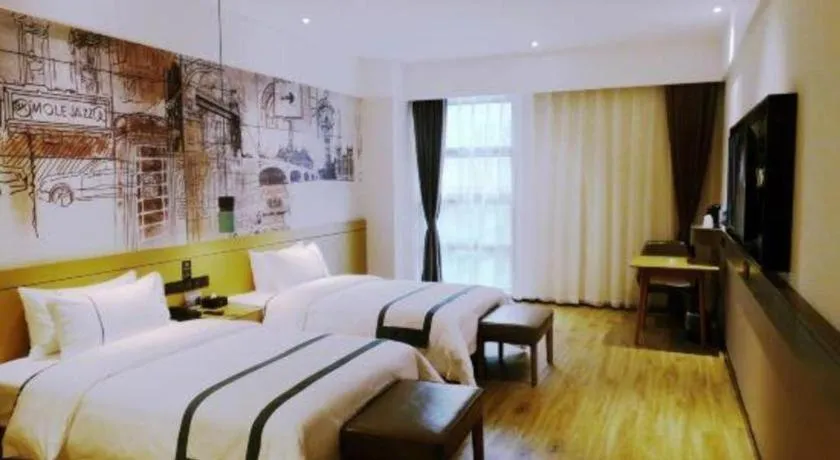 Bed in City Comfort Inn Meishan Wanda Plaza