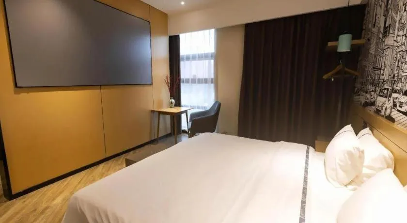 Bed in City Comfort Inn Meishan Wanda Plaza