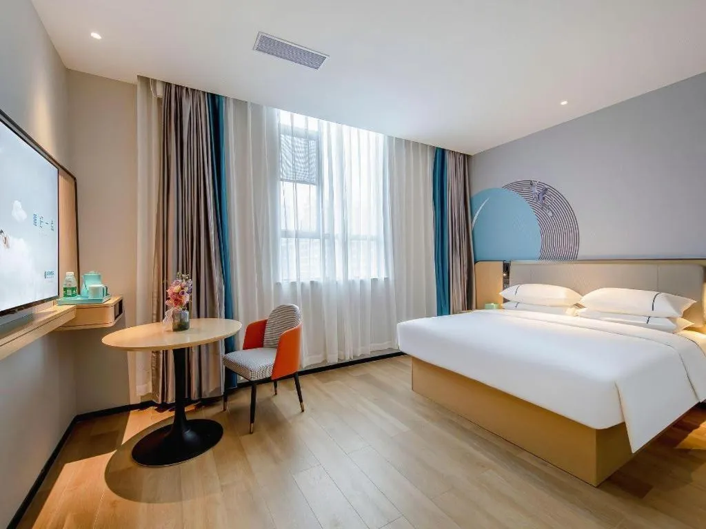 Bed in City Comfort Inn Guilin Jiatianxia Square International Conferences & Exhibition Center