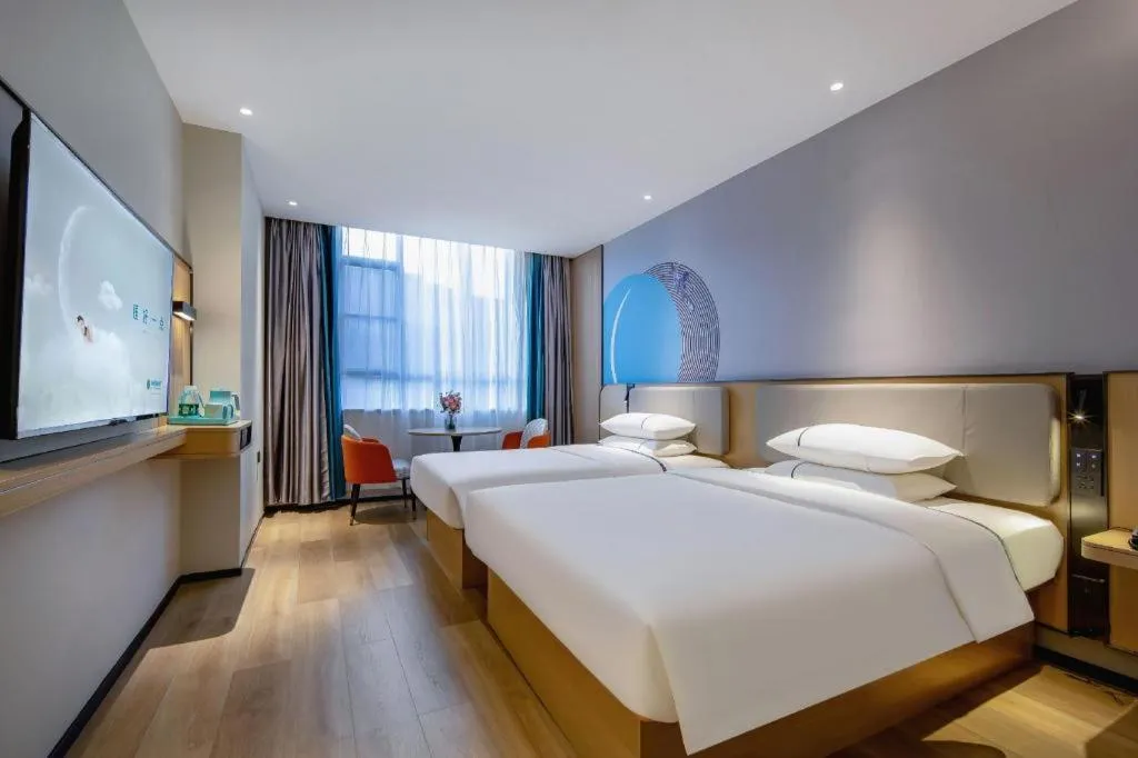 Bed in City Comfort Inn Guilin Jiatianxia Square International Conferences & Exhibition Center
