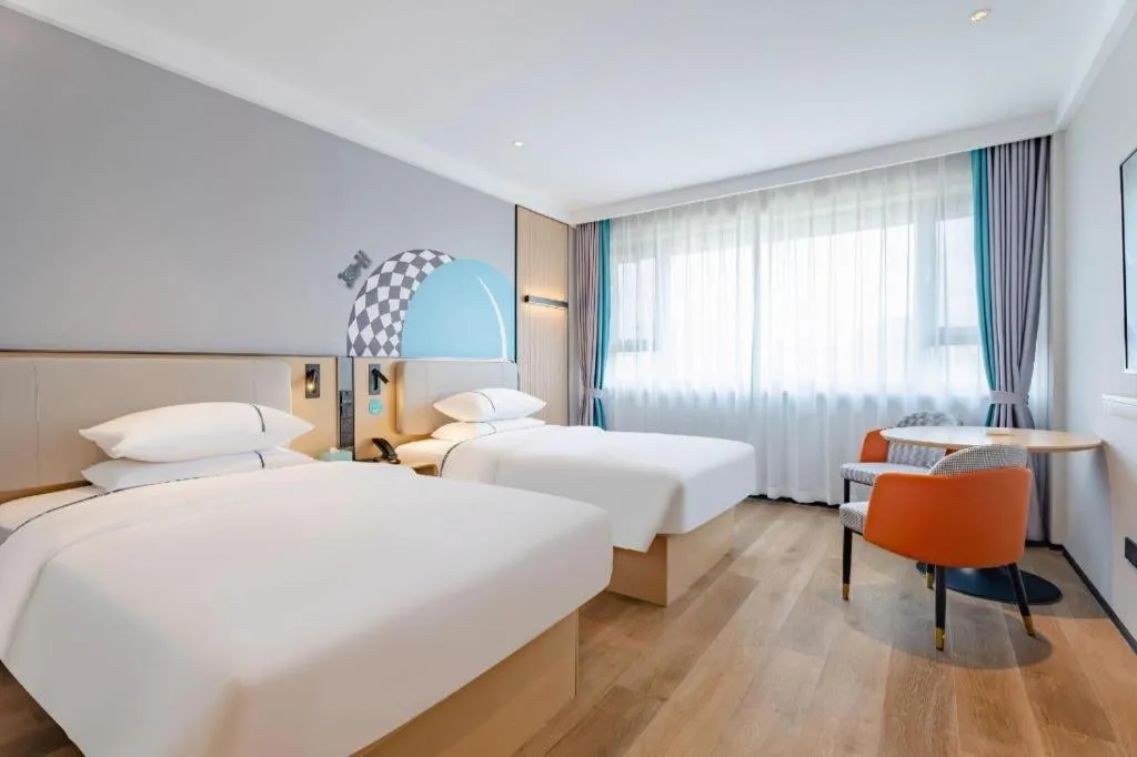 Bed in City Comfort Inn Guilin Jiatianxia Square International Conferences & Exhibition Center