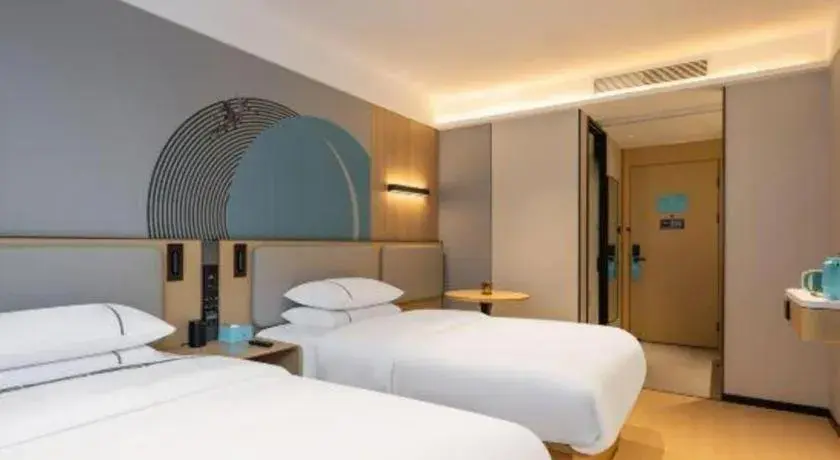 Bed in City Comfort Inn Hechi Bama Shouxiang Avenue Bed in City Comfort Inn Hechi Bama Shouxiang Avenue