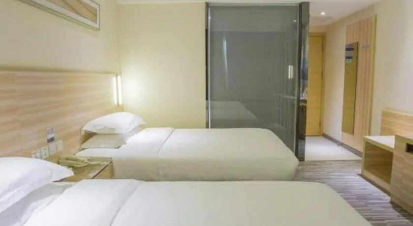 Bed in City Comfort Inn Hechi Bama Shouxiang Avenue
