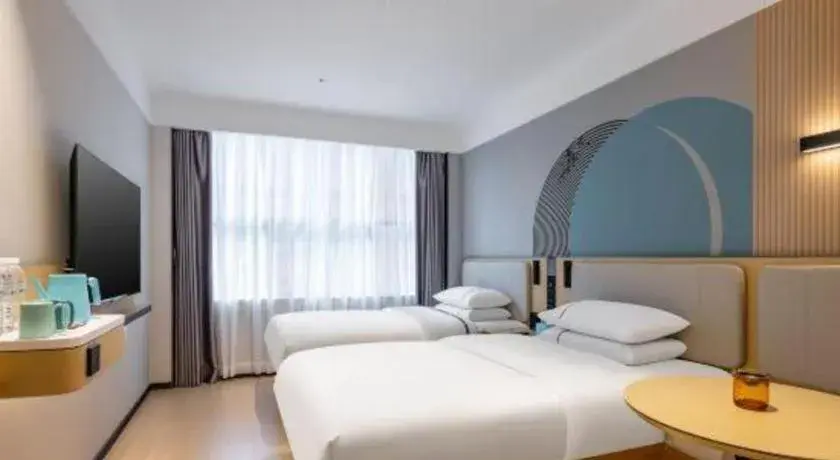 Bed in City Comfort Inn Hechi Bama Shouxiang Avenue Bed in City Comfort Inn Hechi Bama Shouxiang Avenue