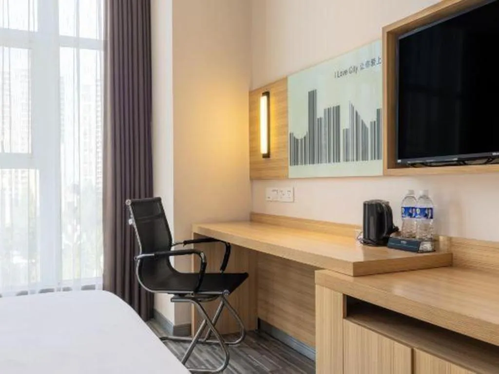 Bed in City Comfort Inn Hechi Bama Shouxiang Avenue