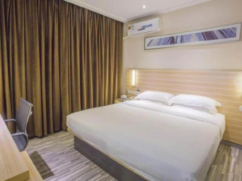 Bed in City Comfort Inn Hechi Bama Shouxiang Avenue