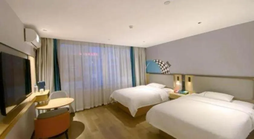 Bed in City Comfort Inn Hechi Bama Shouxiang Avenue