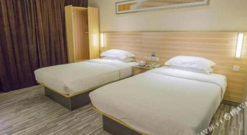 Bed in City Comfort Inn Hechi Bama Shouxiang Avenue
