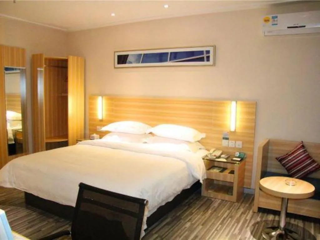 Bed in City Comfort Inn Hechi Bama Shouxiang Avenue