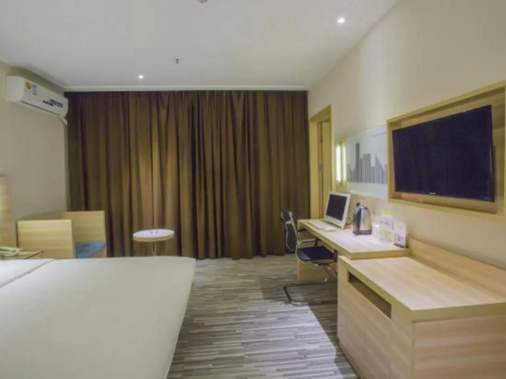 Bed in City Comfort Inn Hechi Bama Shouxiang Avenue