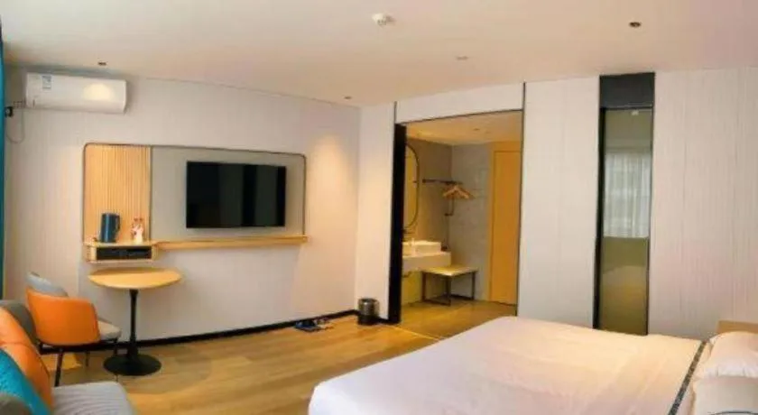 Bed in City Comfort Inn Hechi Bama Shouxiang Avenue