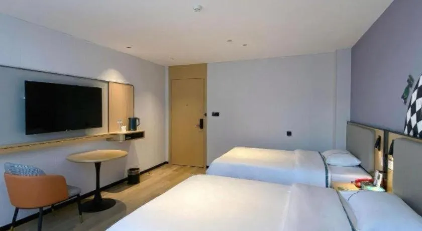 Bed in City Comfort Inn Hechi Bama Shouxiang Avenue