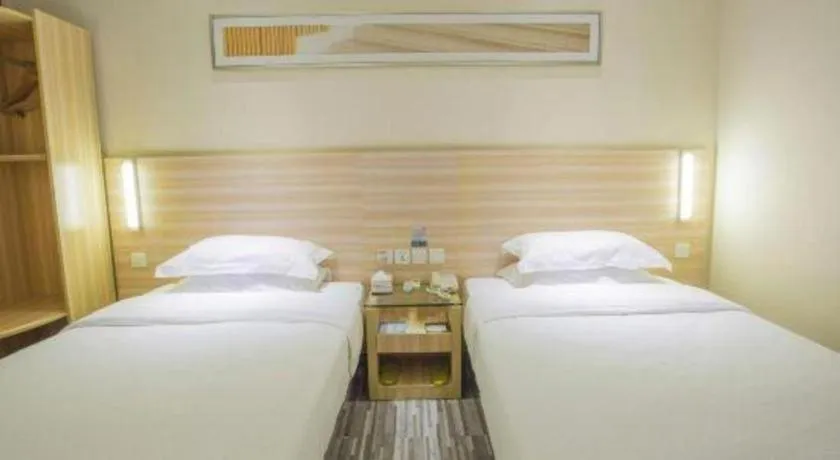 Bed in City Comfort Inn Hechi Bama Shouxiang Avenue
