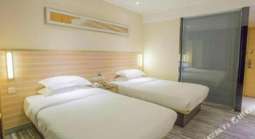 Bed in City Comfort Inn Hechi Bama Shouxiang Avenue