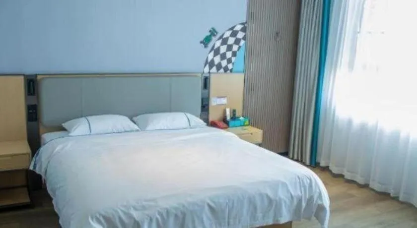 Bed in City Comfort Inn Hechi Bama Shouxiang Avenue