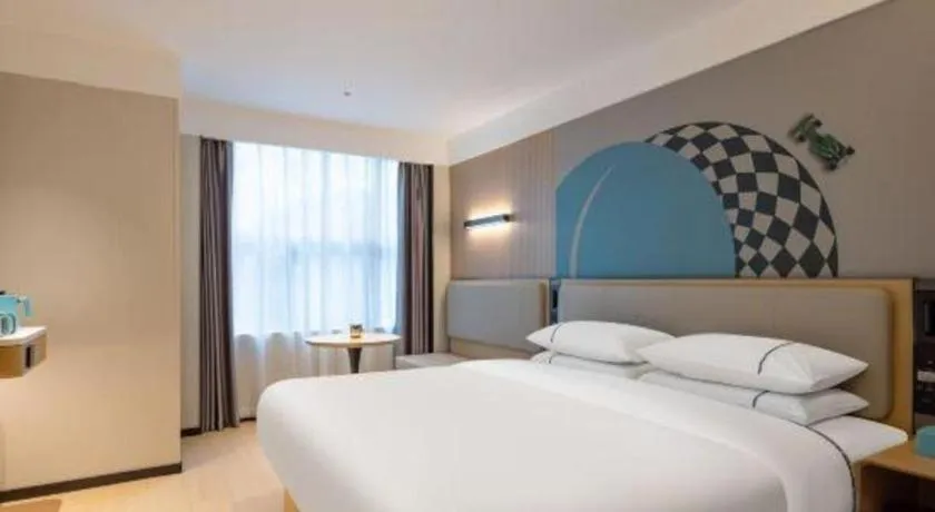 Bed in City Comfort Inn Hechi Bama Shouxiang Avenue