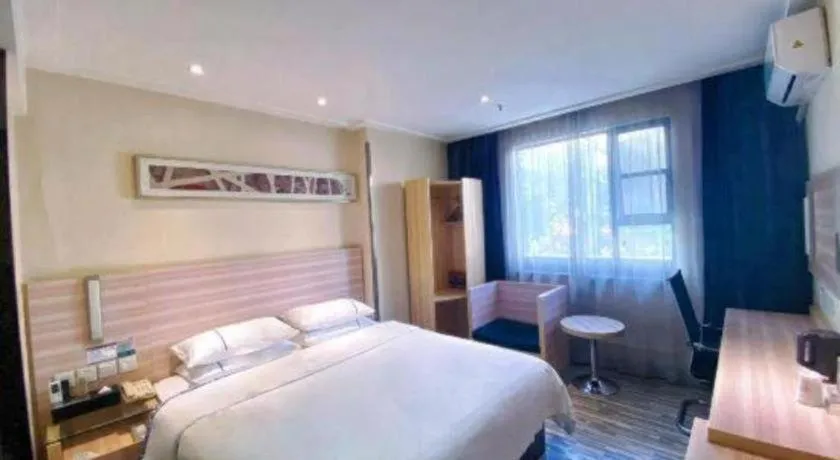 Bed in City Comfort Inn Hechi Bama Shouxiang Avenue