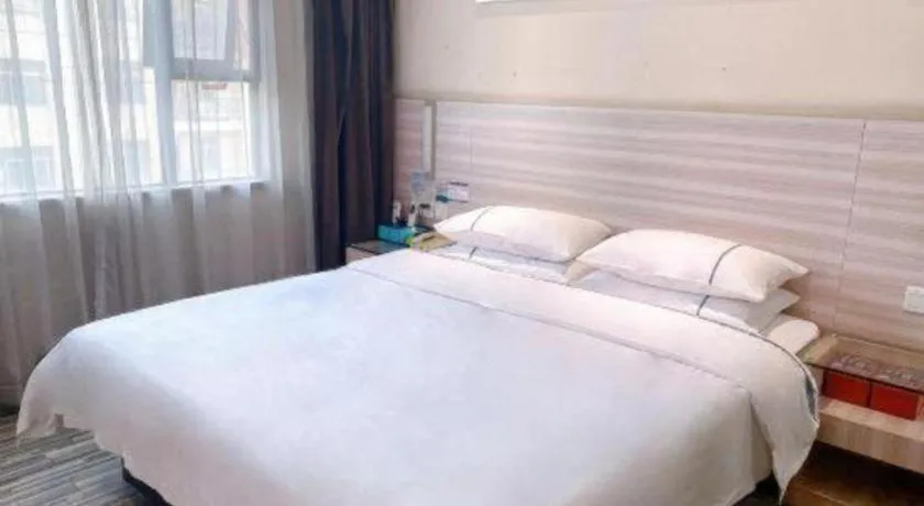 Bed in City Comfort Inn Hechi Bama Shouxiang Avenue