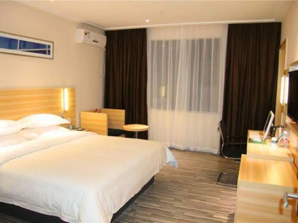 Bed in City Comfort Inn Hechi Bama Shouxiang Avenue