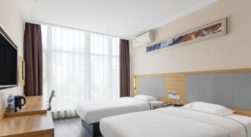 Bed in City Comfort Inn Hechi Bama Shouxiang Avenue