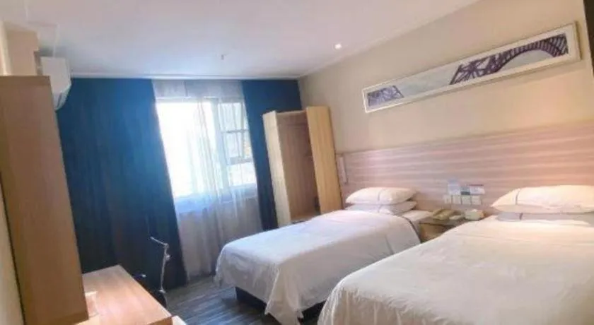 Bed in City Comfort Inn Hechi Bama Shouxiang Avenue