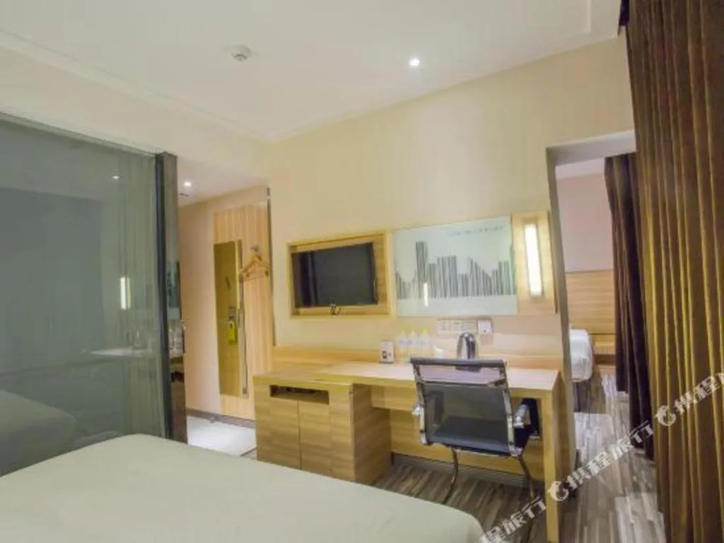 Bed in City Comfort Inn Hechi Bama Shouxiang Avenue