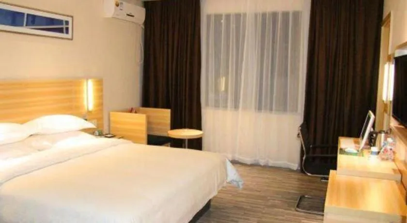 Bed in City Comfort Inn Hechi Bama Shouxiang Avenue