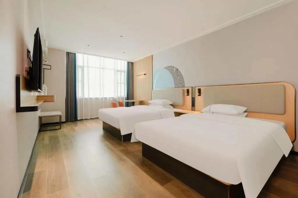Bed in City Comfort Inn Chongzuo Youyi Avenue