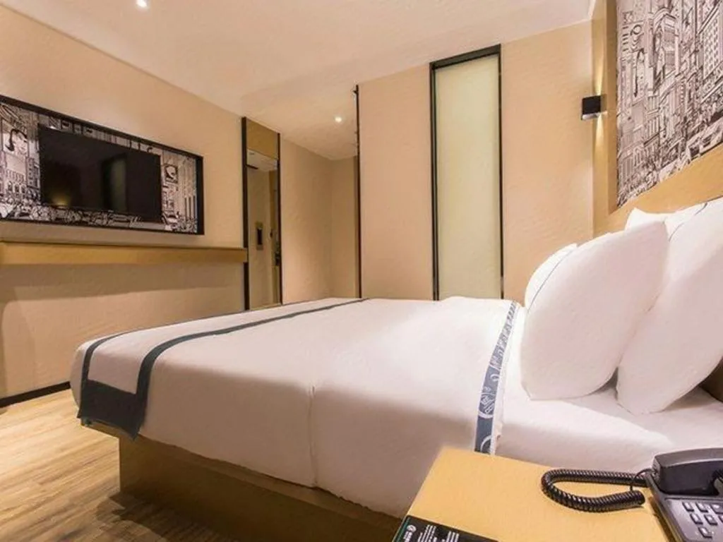 Bed in City Comfort Inn Nanning International Exhibition Jinhu Plaza