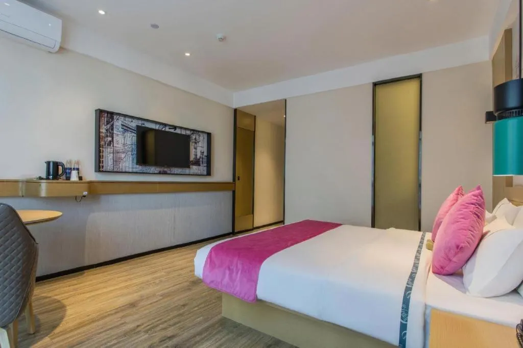 Bed in City Comfort Inn Nanning International Exhibition Jinhu Plaza