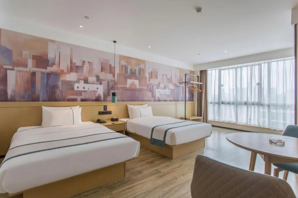 Bed in City Comfort Inn Nanning International Exhibition Jinhu Plaza