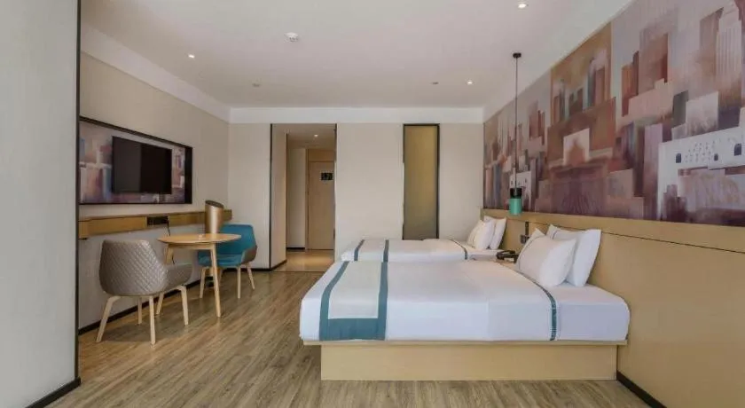 Bed in City Comfort Inn Nanning International Exhibition Jinhu Plaza