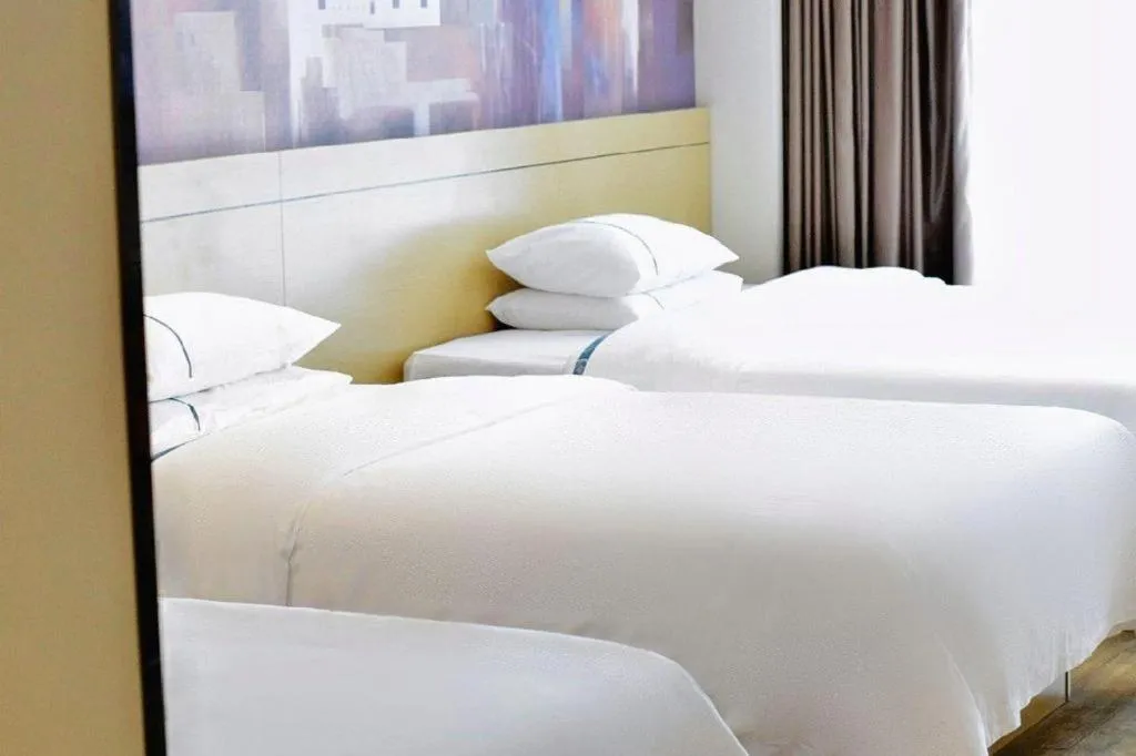 Bed in City Comfort Inn Nanning International Exhibition Jinhu Plaza