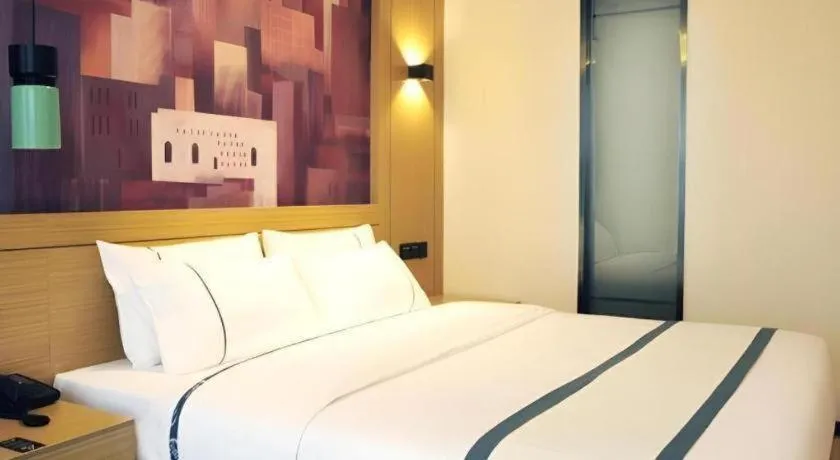 Bed in City Comfort Inn Suizhou Bingzi Wanda