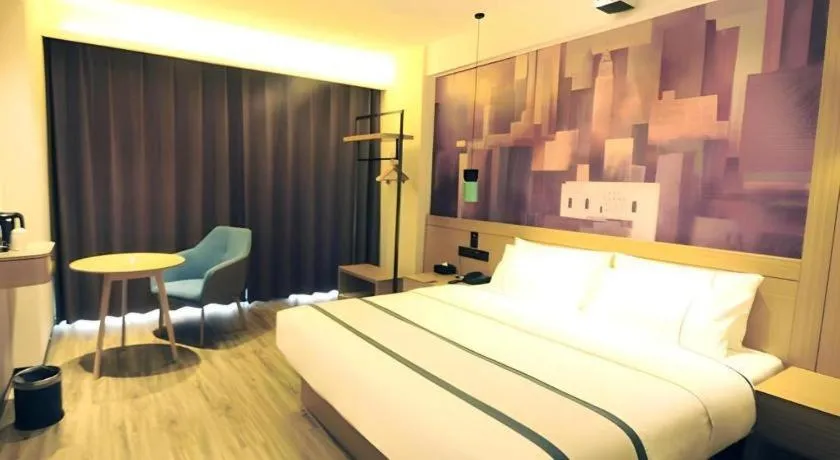 Bed in City Comfort Inn Suizhou Bingzi Wanda