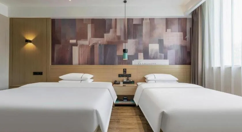 Bed in City Comfort Inn Suizhou Bingzi Wanda