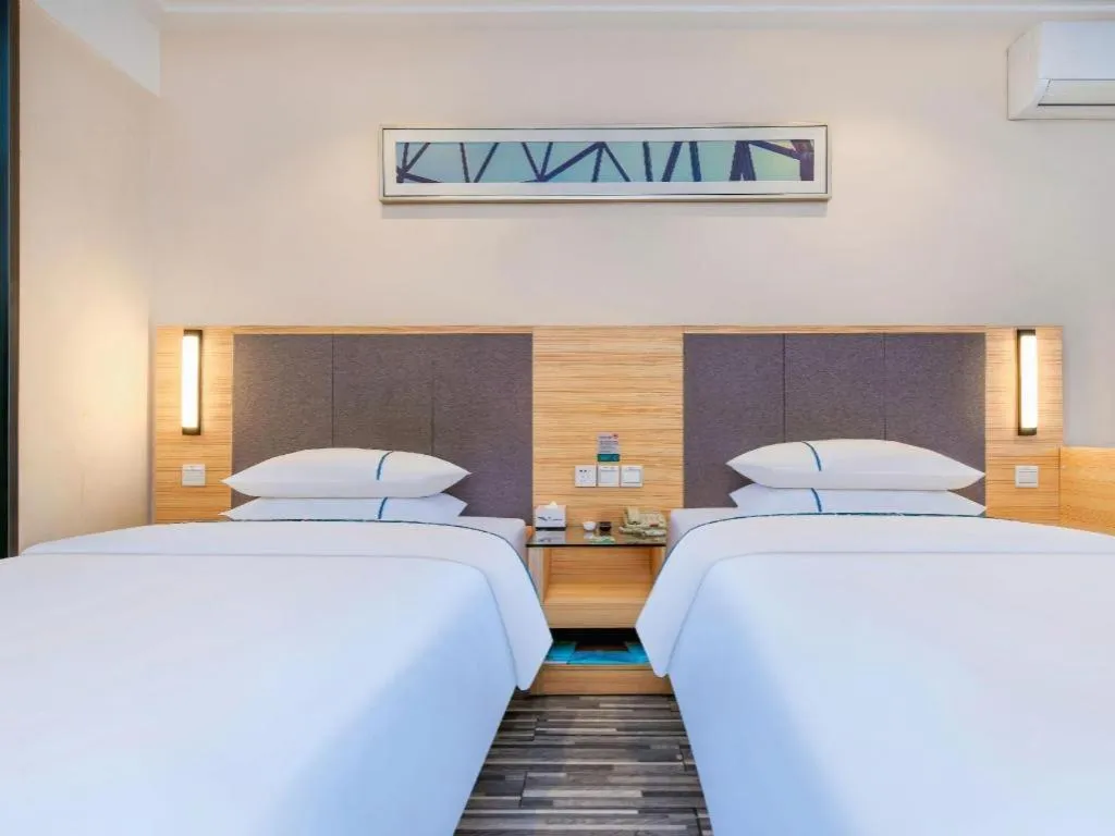 Bed in City Comfort Inn Chongqing Shiqiao Plaza Metro Station