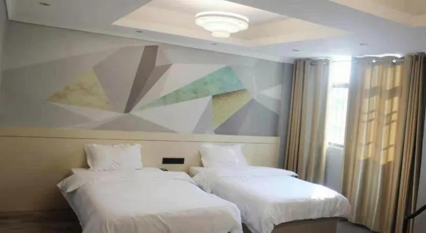 Bed in City Comfort Inn Shaoguan High-speed Railway Station Xilian Examination Center