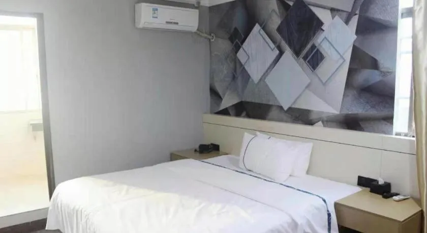 Bed in City Comfort Inn Shaoguan High-speed Railway Station Xilian Examination Center