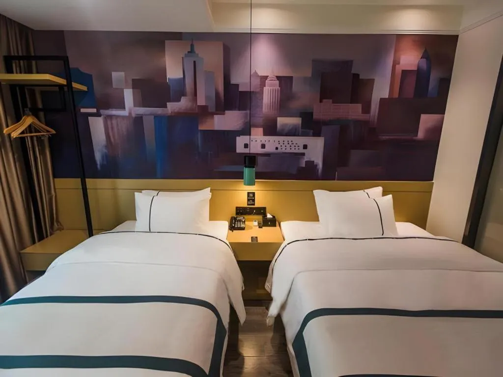 Bed in City Comfort Inn Shaoguan High-speed Railway Station Xilian Examination Center