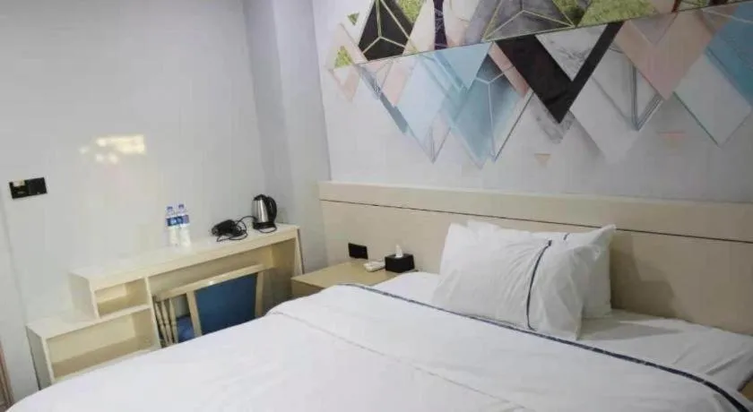 Bed in City Comfort Inn Shaoguan High-speed Railway Station Xilian Examination Center