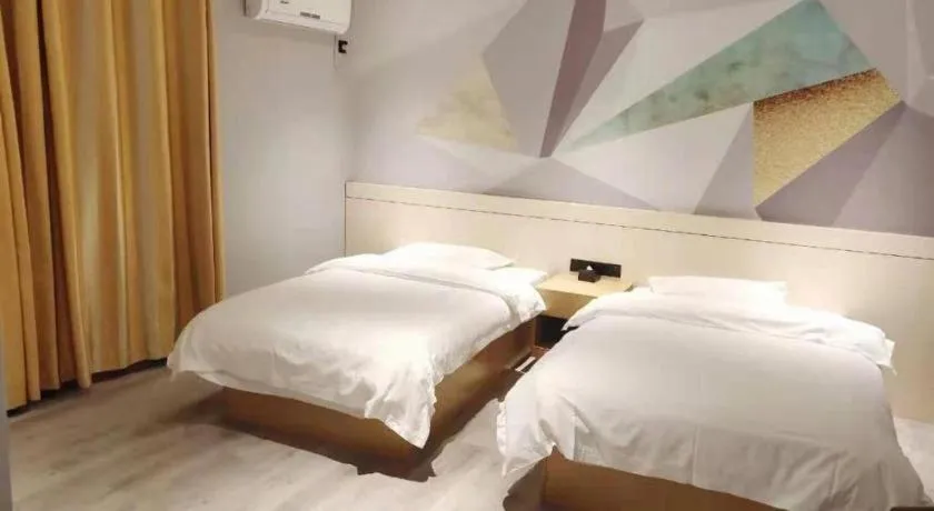 Bed in City Comfort Inn Shaoguan High-speed Railway Station Xilian Examination Center