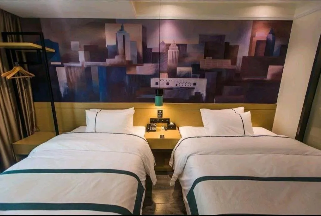 Bed in City Comfort Inn Shaoguan High-speed Railway Station Xilian Examination Center