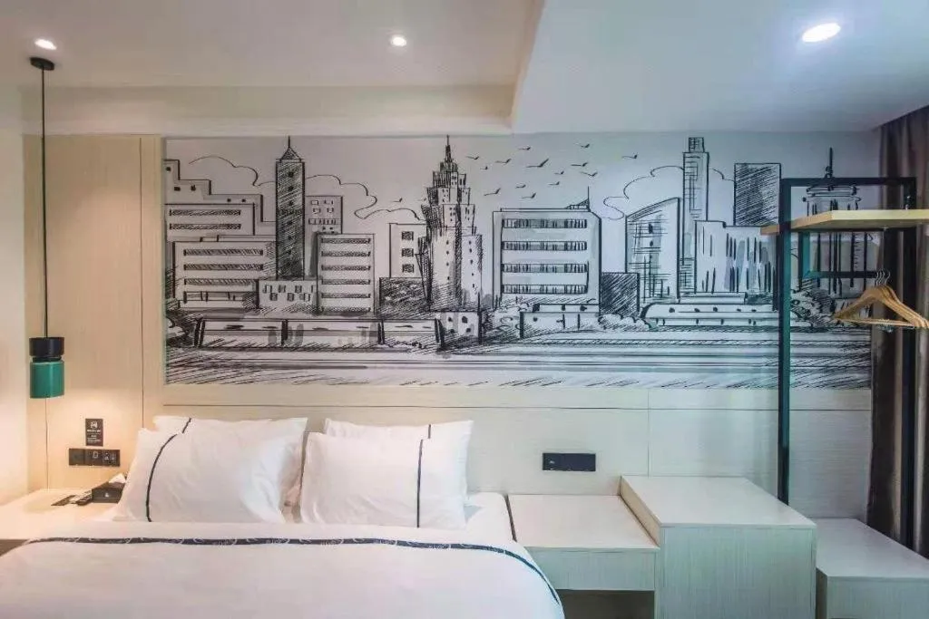 Bed in City Comfort Inn Shaoguan High-speed Railway Station Xilian Examination Center