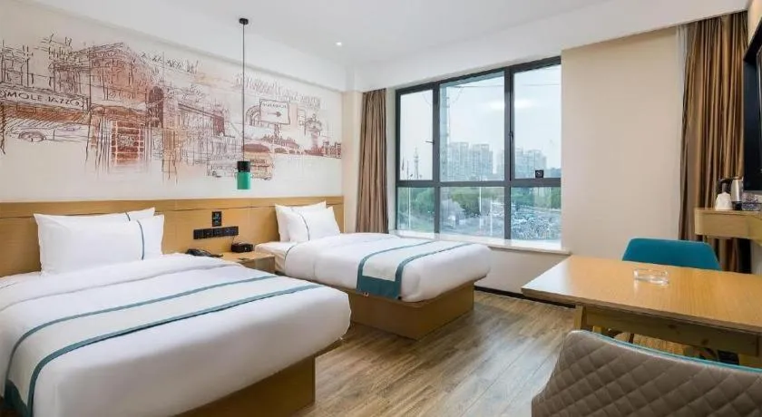 Bed in City Comfort Inn Taizhou Wanda Plaza