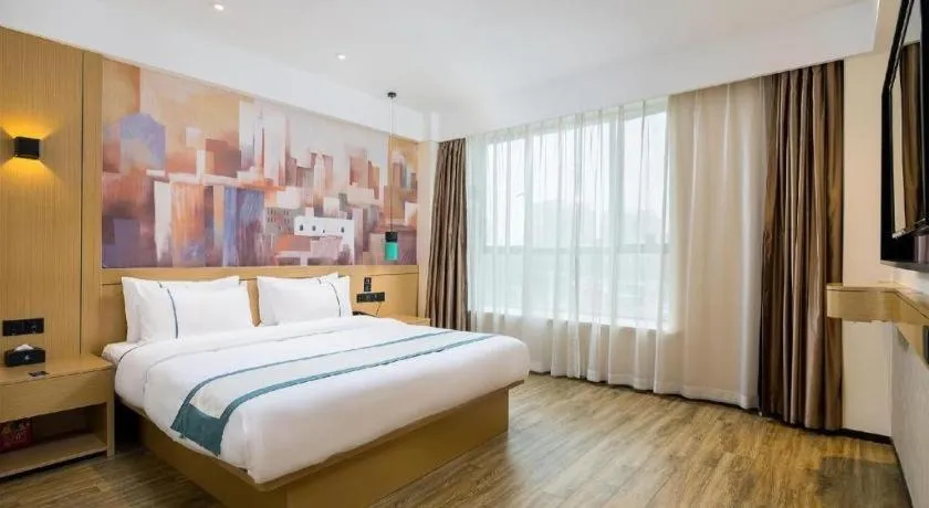 Bed in City Comfort Inn Taizhou Wanda Plaza
