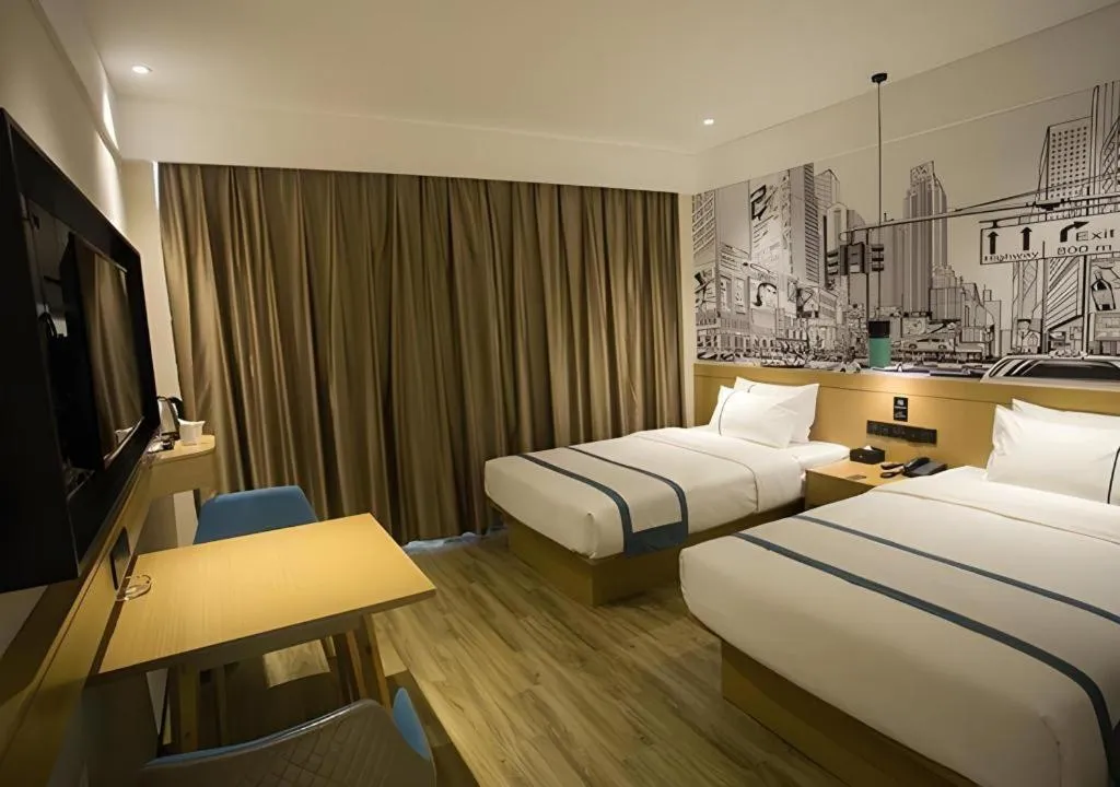 Bed in City Comfort Inn Taizhou Wanda Plaza