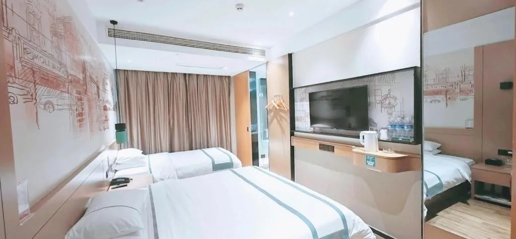 Bed in City Comfort Inn Taizhou Wanda Plaza